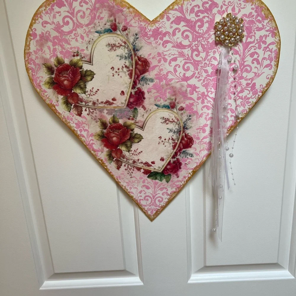 Elegant Pink Heart Wreath with Red Floral Design